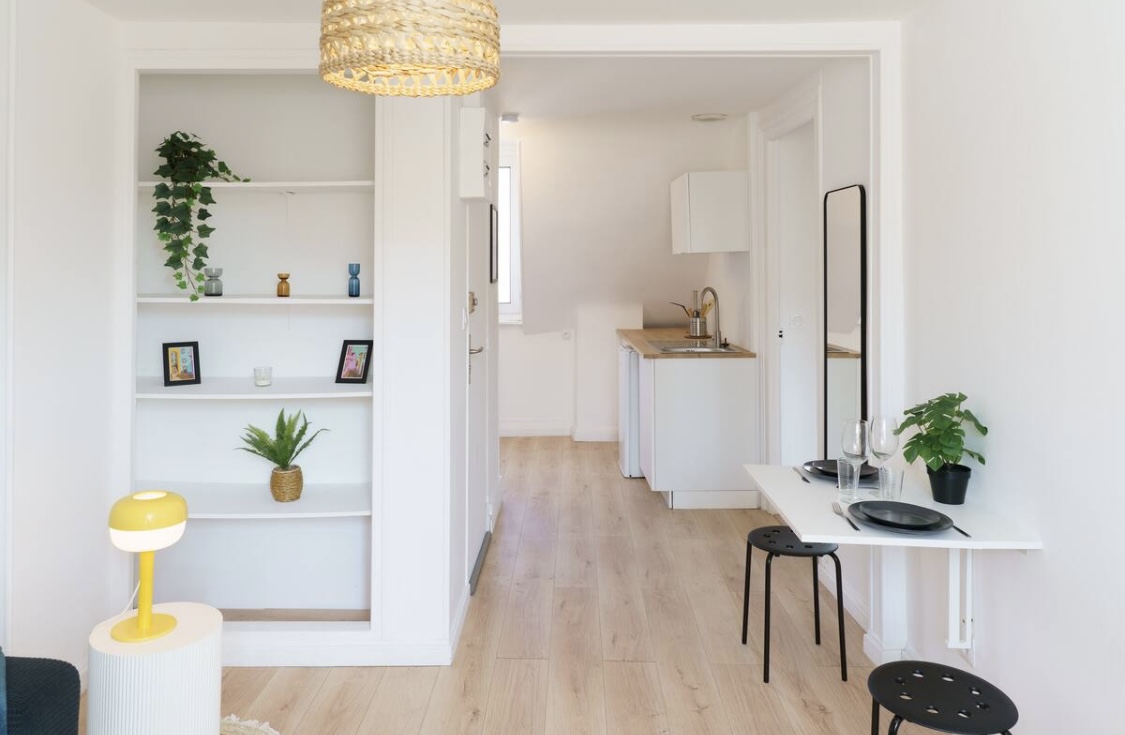 Après rénovation — salon bien immobilier locatif rentable